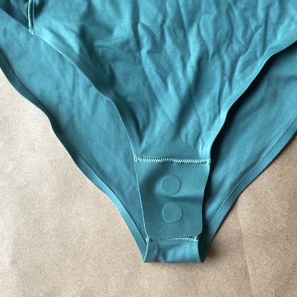 Wundermost Ultra-Soft
Nulu High-Neck
Sleeveless Bodysuit - Picture 3 of 8